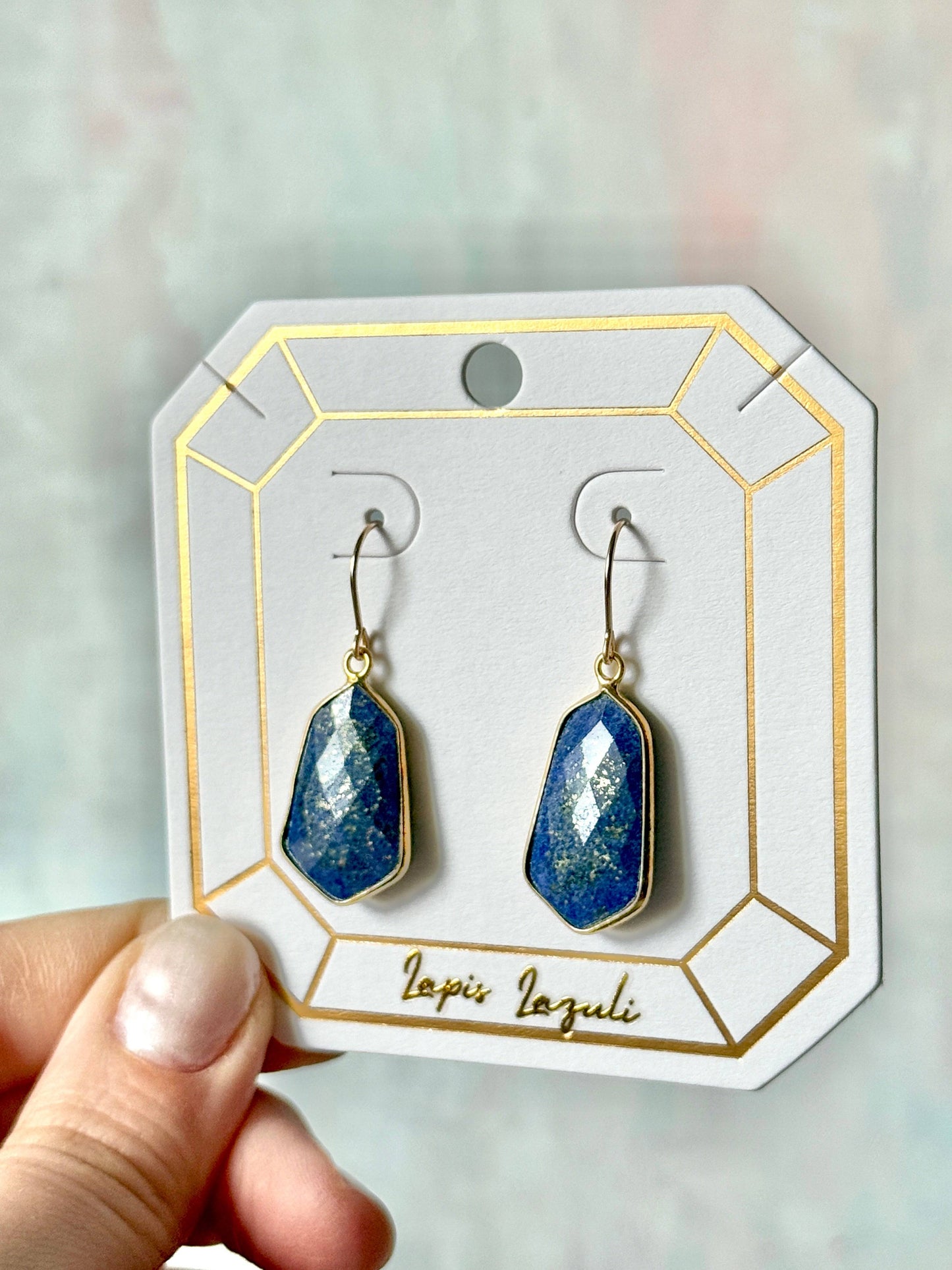 Lydia earrings featuring lightweight, 1-inch gemstone drops in lapis lazuli, set in gold-plated frames for a timeless, elegant look