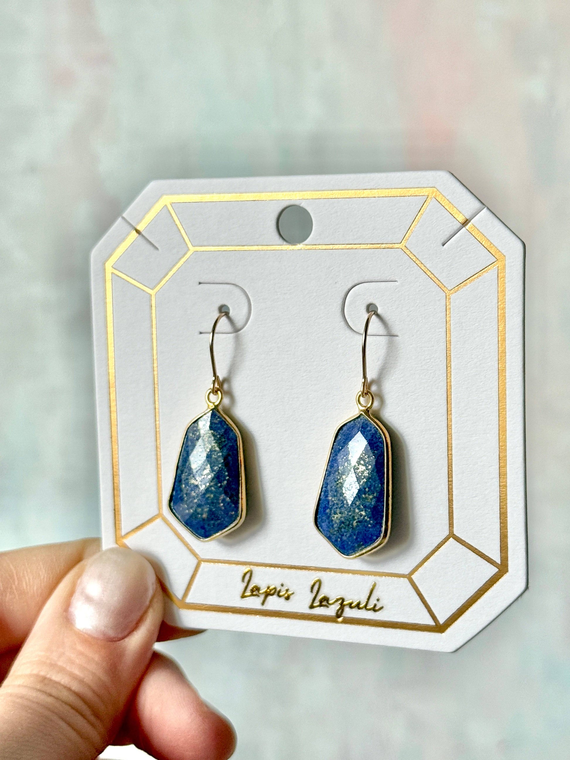 Lydia earrings featuring lightweight, 1-inch gemstone drops in lapis lazuli, set in gold-plated frames for a timeless, elegant look