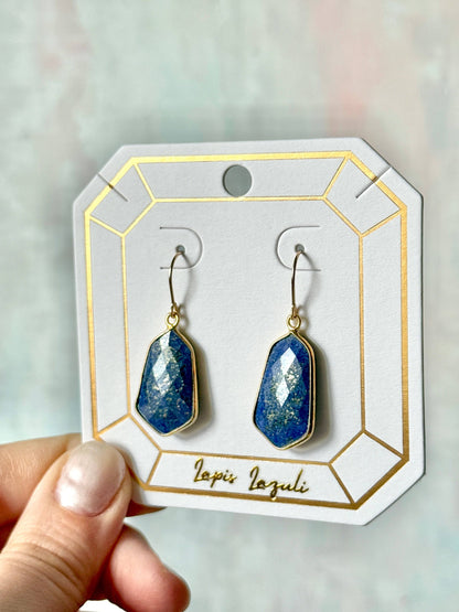 Lydia earrings featuring lightweight, 1-inch gemstone drops in lapis lazuli, set in gold-plated frames for a timeless, elegant look