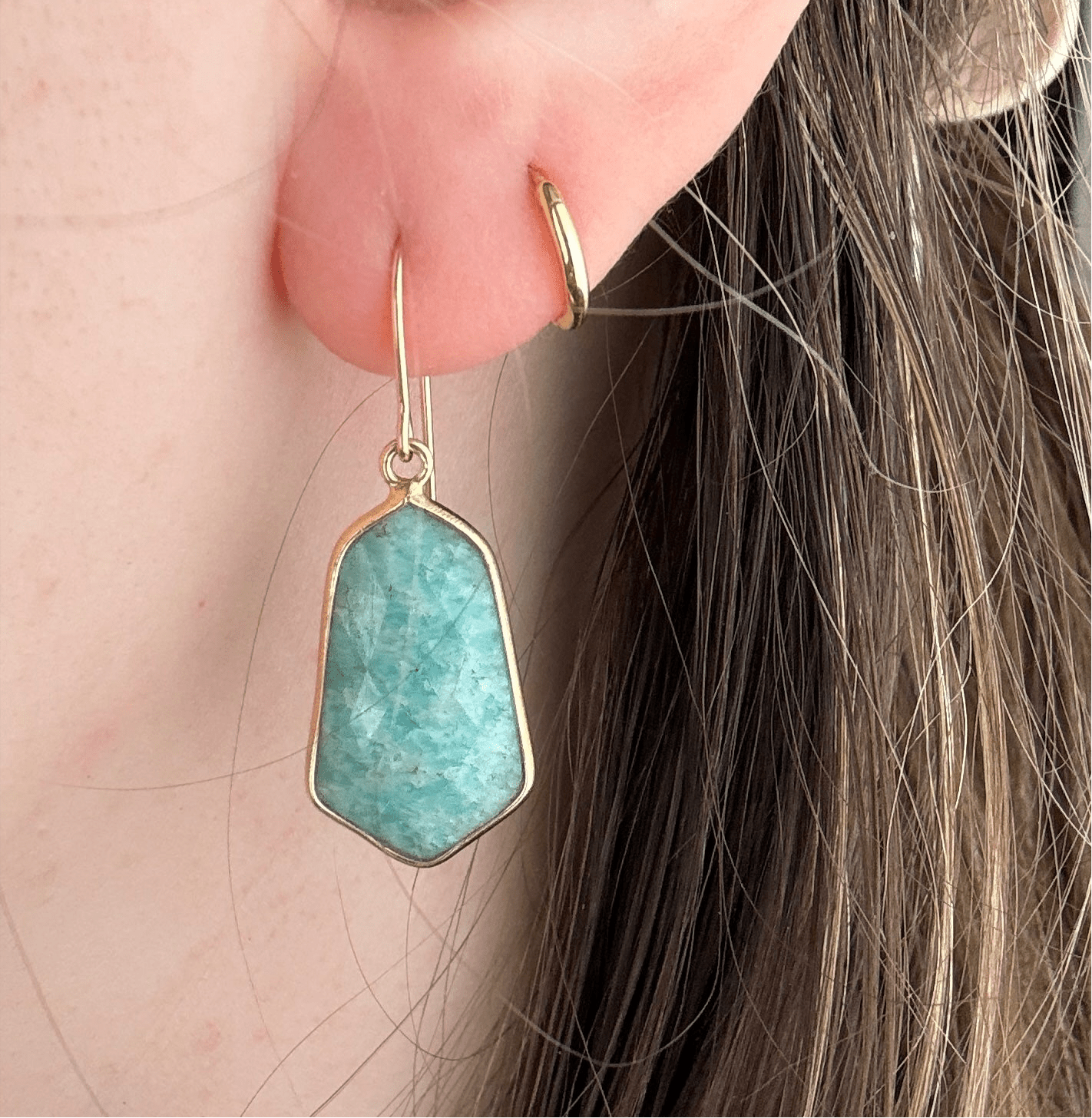 Lydia earrings featuring lightweight, 1-inch gemstone drops in a variety of vibrant stones like moonstone, rose quartz, and turquoise, set in gold-plated frames for a timeless, elegant look