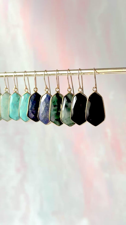 Lydia earrings featuring lightweight, 1-inch gemstone drops in a variety of vibrant stones like moonstone, rose quartz, and turquoise, set in gold-plated frames for a timeless, elegant look